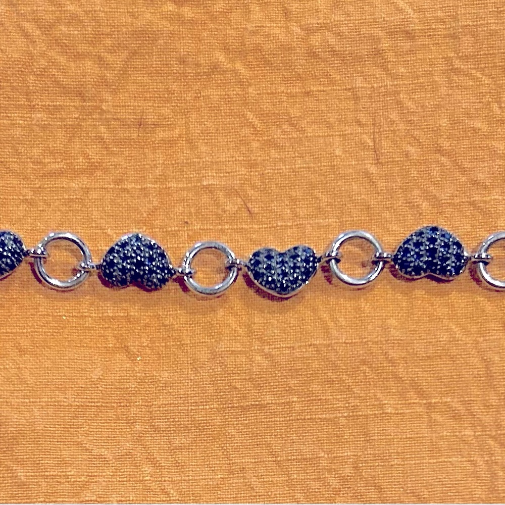 Jared’s silver multi paved sapphire heart bracelet